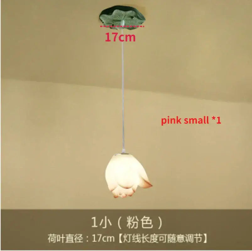 DecorBites lotus glass pendant features a delicate pink lotus shape with soft white lampshade and green leafy top