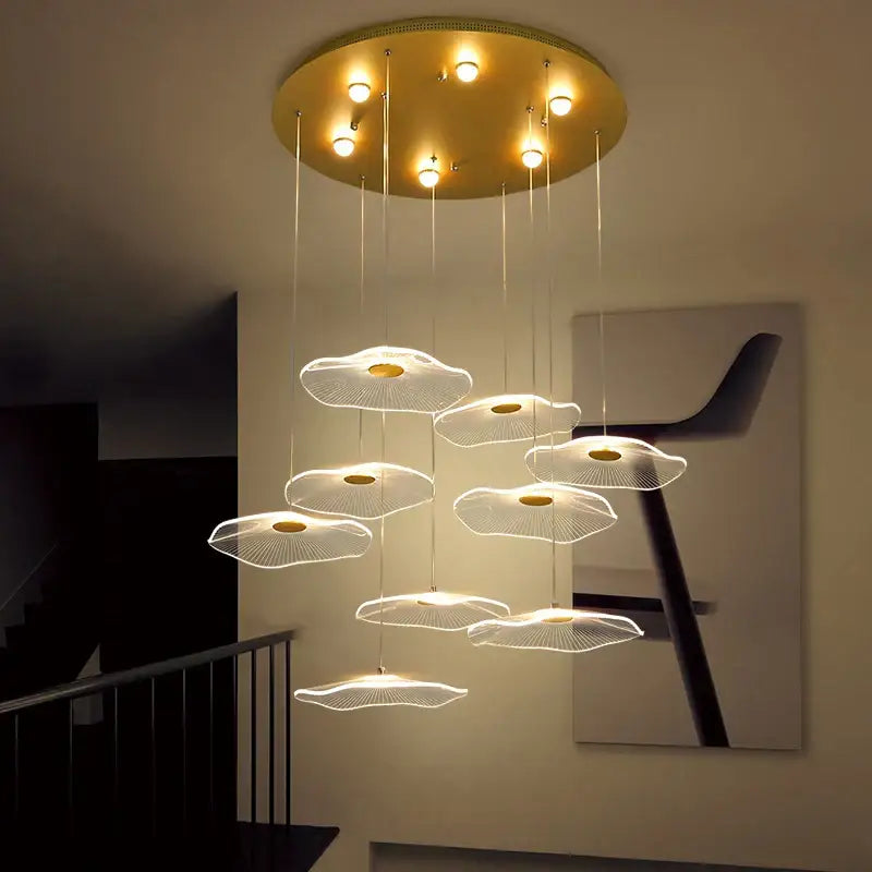 Modern cloud-shaped pendant chandelier with gold ceiling mount and white diffusers decorbites lotus leaf design