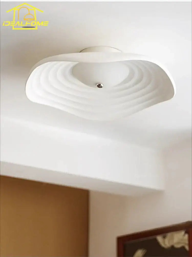 White modern ceiling light with concentric circular ridges and metallic bulb holder decorbites lotus leaf ceiling light