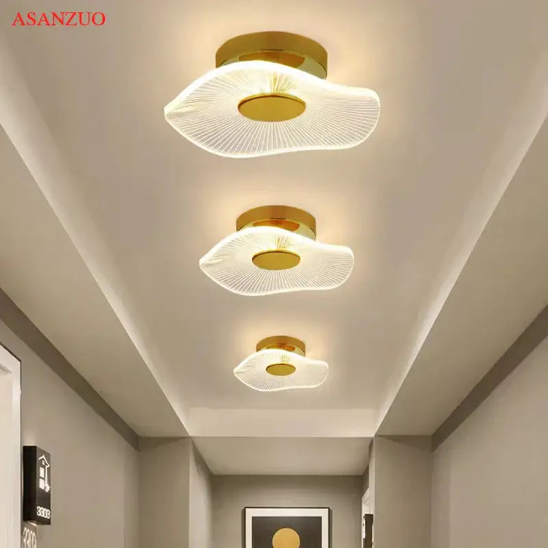 Gold-finished decorbites lotus leaf ceiling light with translucent radiating glass shade for porch or bedroom use