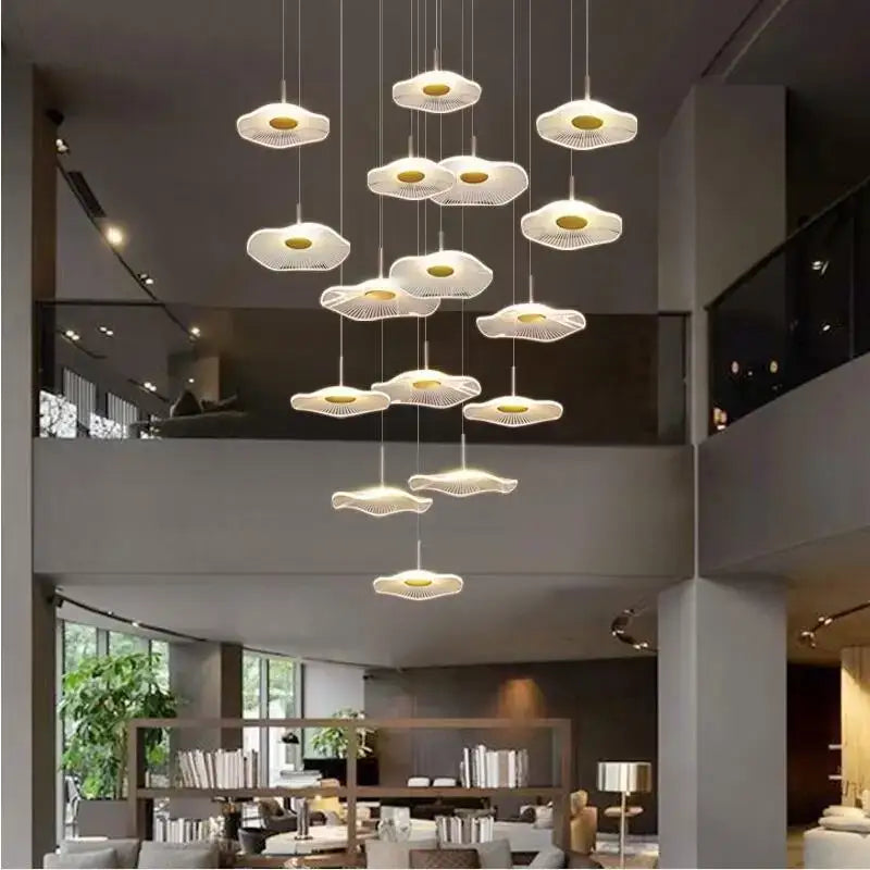 A modern white decorbites lotus leaf chandelier with acrylic petal design and gold-toned centers for living room decor