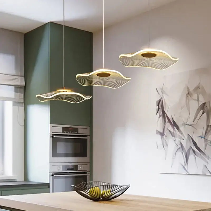 Three gold-toned decorbites lotus leaf chandelier pendant lights with acrylic radial wire mesh for modern living room decor