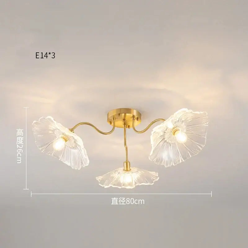 Gold-toned decorbites lotus leaf glass ceiling chandelier with three clear petal-shaped leaf glass shades and e14 bulb
