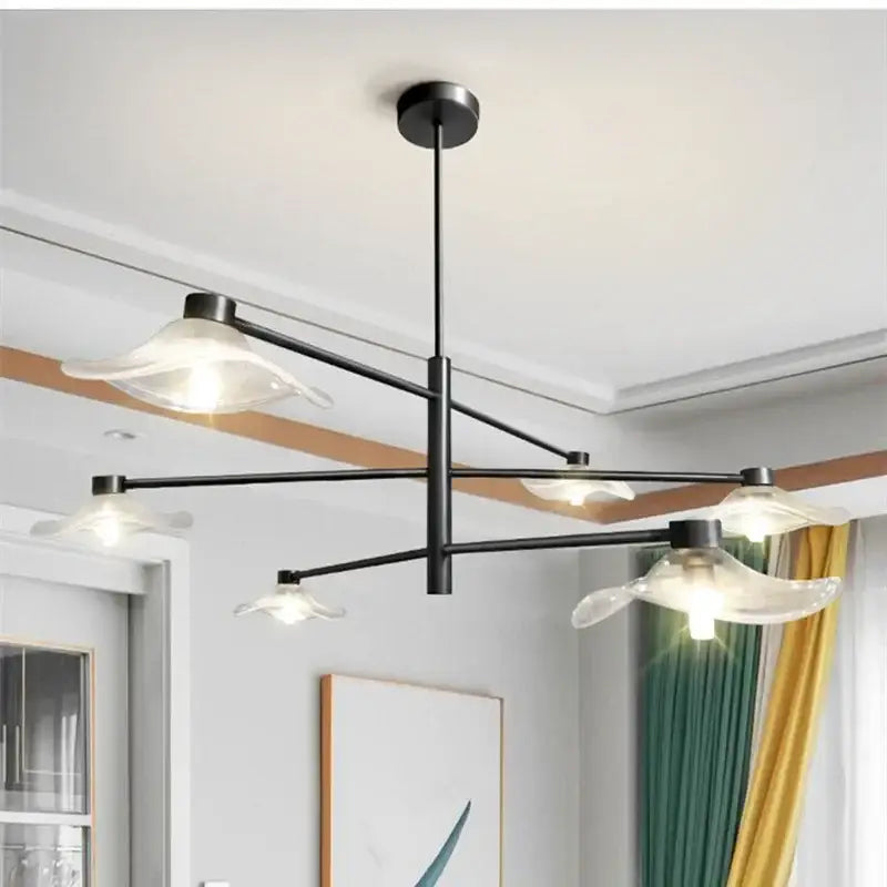 Modern black metal chandelier with five translucent lotus leaf glass lampshades by decorbites for living room lighting