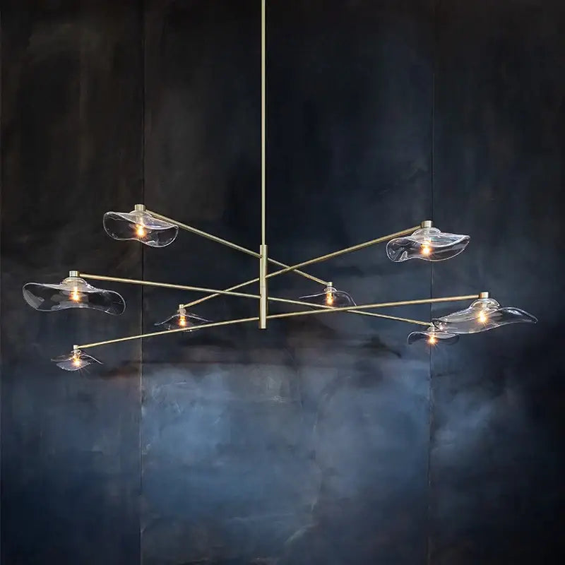 Modern brass DecorBites lotus leaf chandelier with six clear leaf-shaped glass shades for living room lighting