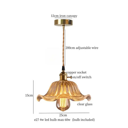 A brass-finished decorbites lotus leaf glass pendant light with clear shade and exposed led bulb for loft and dining areas