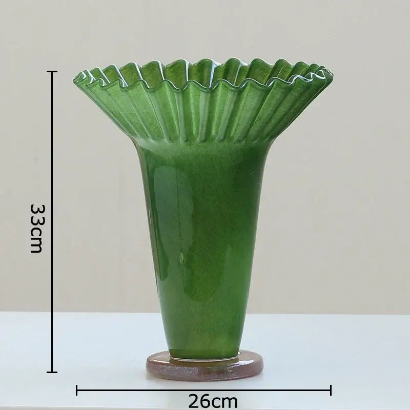 A glossy emerald green ceramic decorbites lotus leaf glass vase with fluted rim for elegant table decor and plant pot
