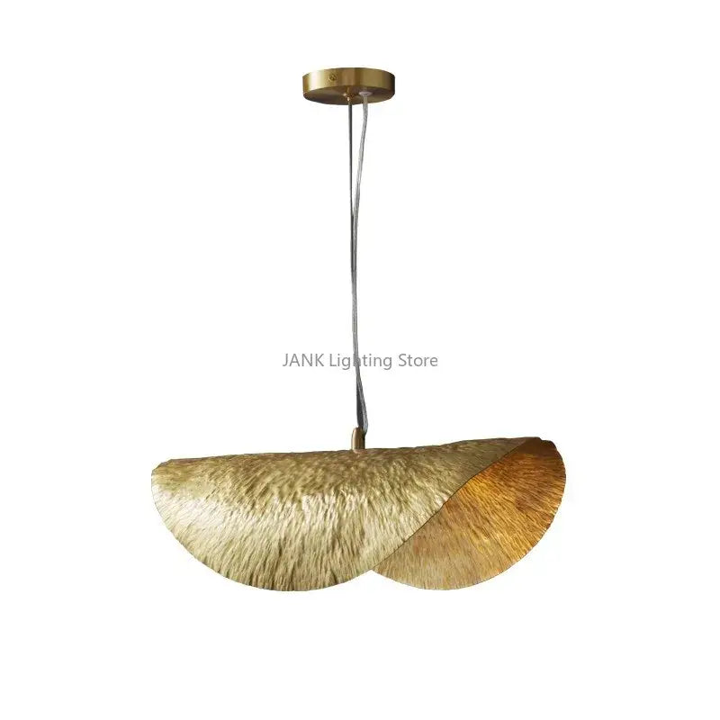 Gold-toned textured pendant lamp with lotus leaf hat design by decorbites for elegant living room and restaurant decor
