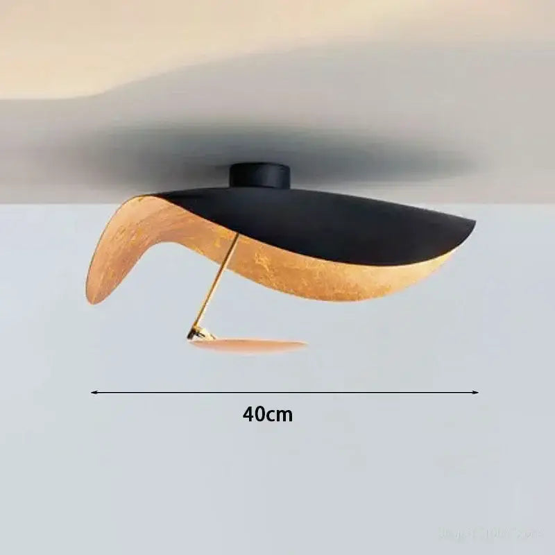 A decorbites lotus leaf led ceiling chandelier with sleek black and golden curved design for indoor lighting