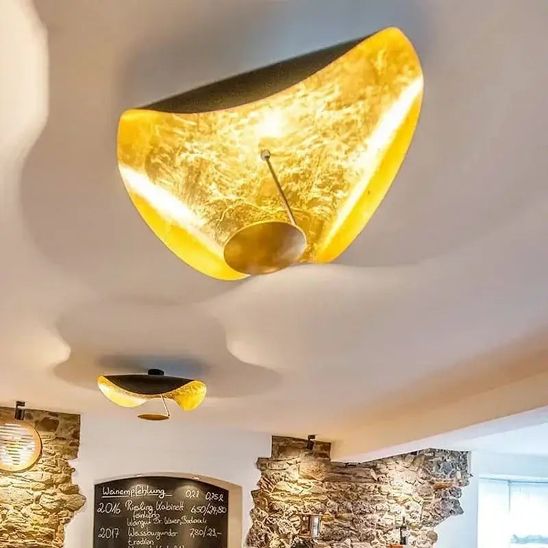 Decorbites lotus leaf led ceiling chandelier in golden yellow with curved organic design and textured surface for indoor use