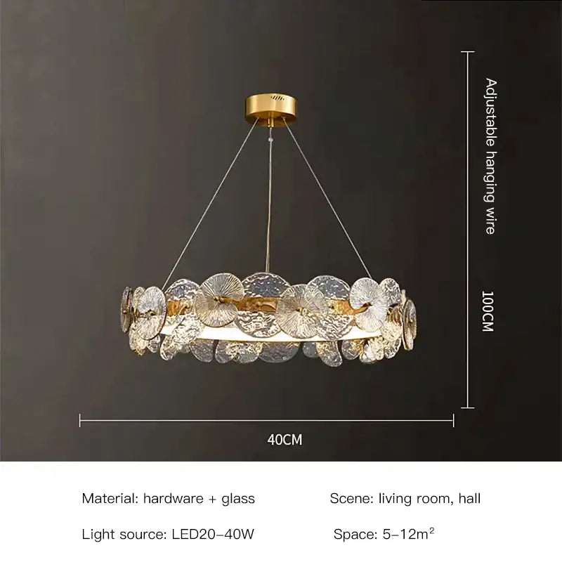 Gold-toned decorbites™ lotus leaf led chandelier with circular translucent textured glass discs suspended by wires