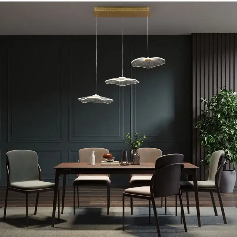 Modern gold-finished decorbites lotus leaf led pendant chandelier with three white fan-shaped leaf led lights for living rooms