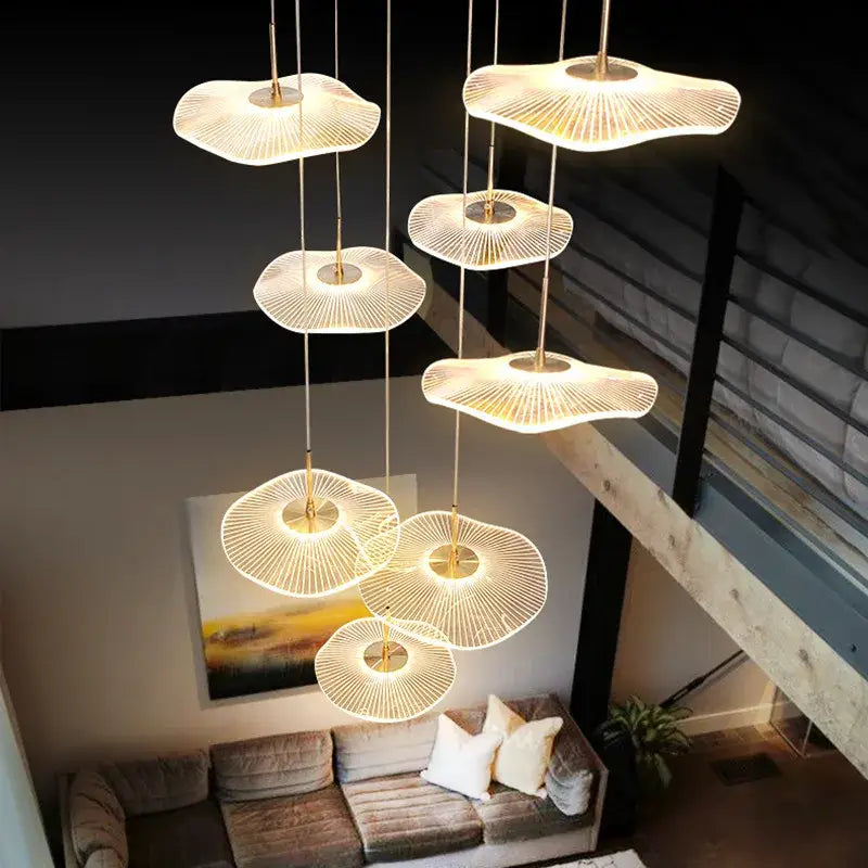 Modern gold-toned decorbites lotus leaf led pendant chandelier with fan-like design and warm glowing light for living room