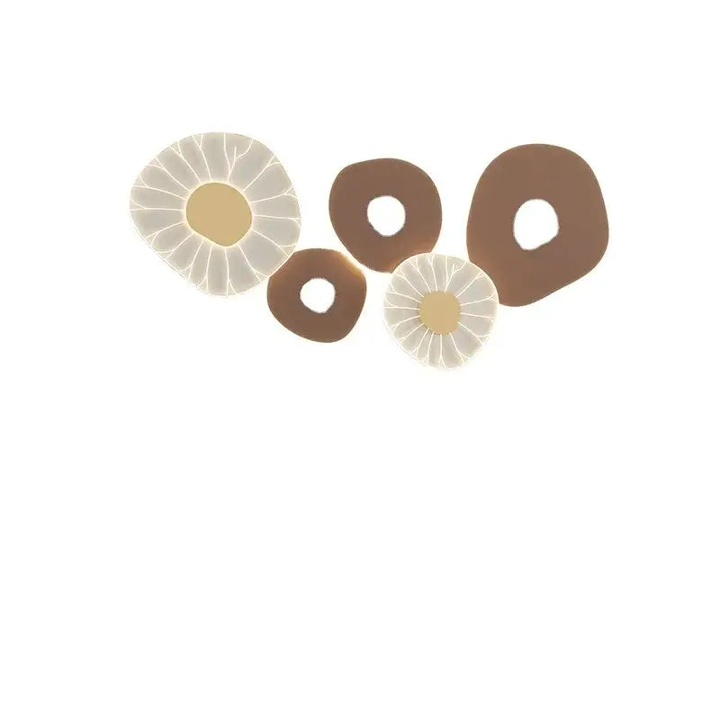 Set of five lotus leaf led wall light pieces in earthy brown and cream tones with textured layered design and dimming modes