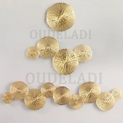Gold-colored decorbites lotus leaf led wall sconce with intricately cut metal in a decorative copper industrial design