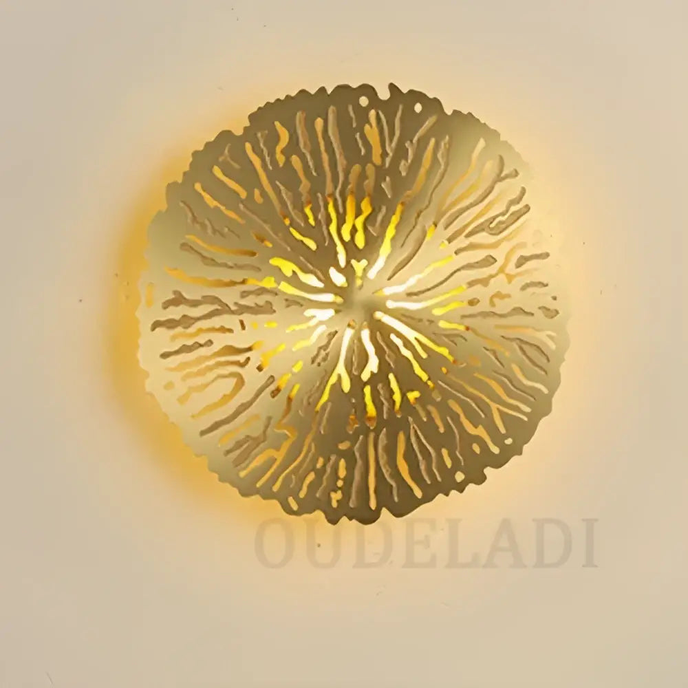 Golden circular decorbites lotus leaf led wall sconce with intricate radial cutout design in copper industrial style