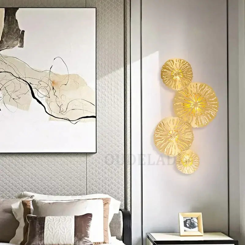 Golden translucent glass wall art with textured petal design in decorbites lotus leaf led copper industrial sconce