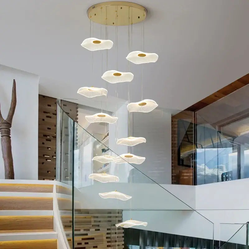 Modern white cloud-shaped pendant lights with gold accents in decorbites lotus leaf nordic chandelier for elegant decor