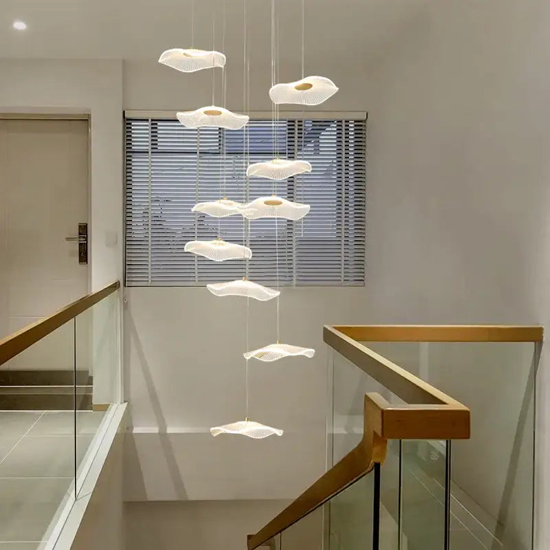Modern white cloud-shaped pendant lights with textured design in the decorbites lotus leaf nordic chandelier for elegant decor