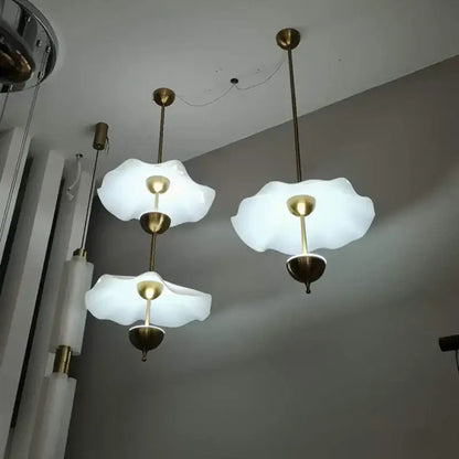 White cloud-like glass pendant lamp with brass accents from decorbites lotus leaf pendant for home and restaurant lighting