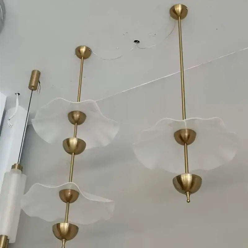 Gold-toned decorbites lotus leaf pendant lamp with translucent petal-shaped glass shades for home or restaurant lighting