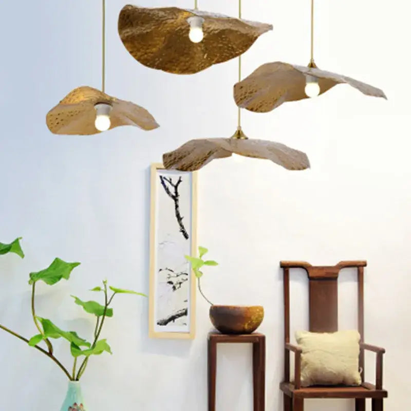 Golden decorbites lotus leaf pendant light with hammered metal finish for industrial luxury home and cafe lighting
