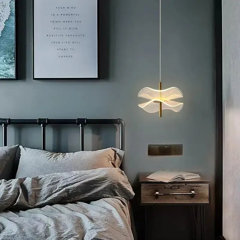 DecorBites™ lotus leaf pendant light with translucent petal shade and gold-toned stem for restaurant and bedroom use