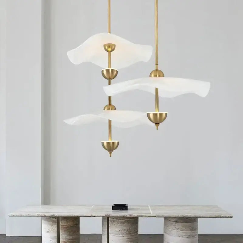 Gold-toned decorbites lotus leaf pendant lights with three flowing translucent glass shades for ceiling staircase chandelier