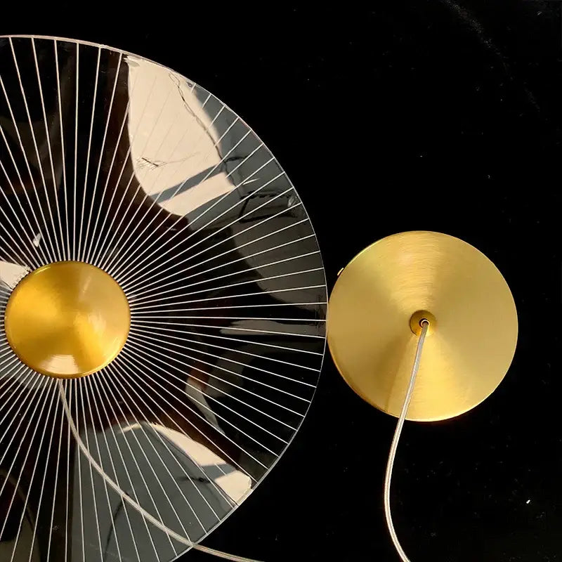 Gold-toned decorbites lotus leaf single pendant lamp with modern LED design and circular mirrored base for various rooms