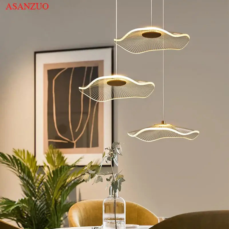 Modern gold-toned decorbites lotus leaf single pendant lamp with radiating wire design for versatile room decor