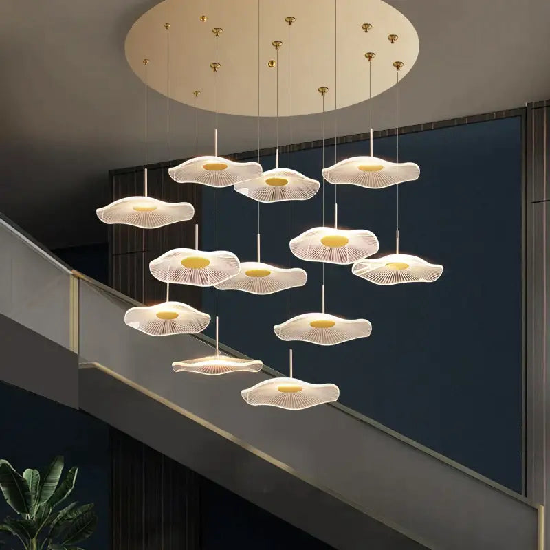 Modern white mushroom-shaped pendant lights with gold accents in decorbites lotus leaf tea art spiral staircase chandelier