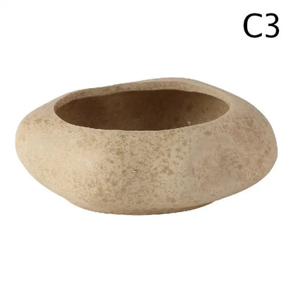 Beige speckled stone sand ceramic vase with smooth rounded edges in DecorBites lotus seedpod vase set
