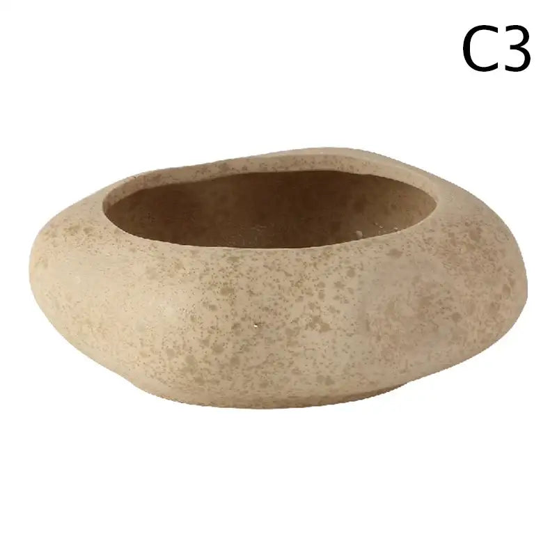 Beige speckled stone sand ceramic vase with smooth rounded edges in DecorBites lotus seedpod vase set
