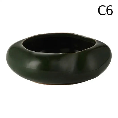Dark green ceramic vase from decorbites™ lotus seedpod set with smooth glossy finish and organic rounded shape