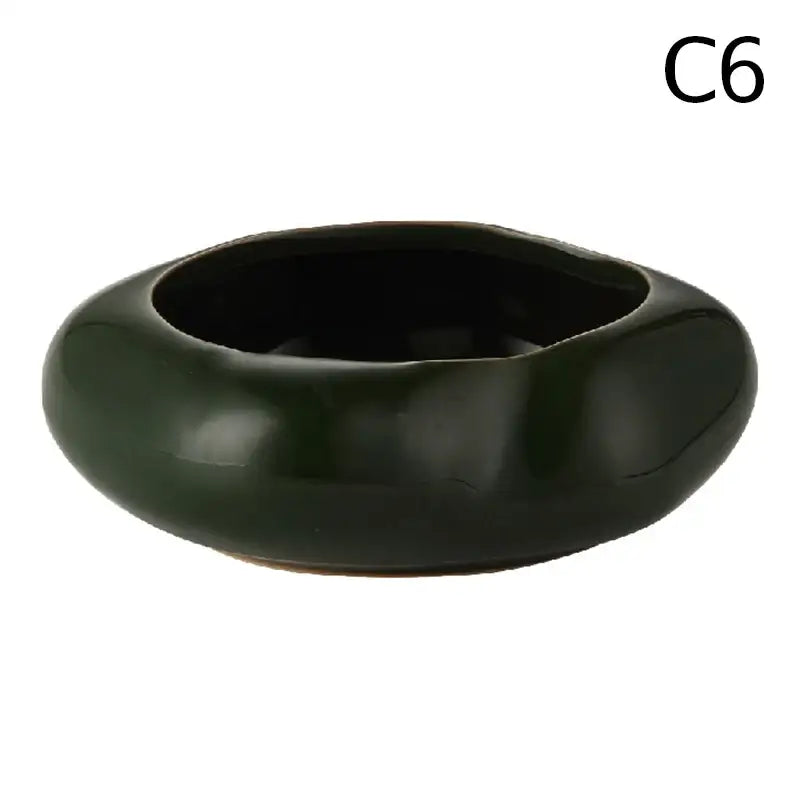 Dark green ceramic vase from decorbites™ lotus seedpod set with smooth glossy finish and organic rounded shape
