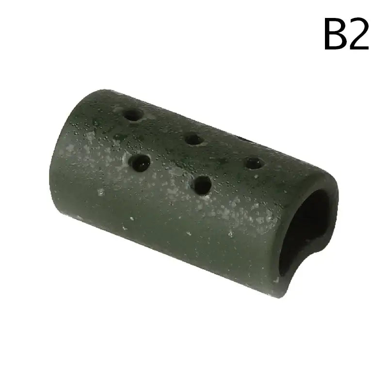Dark green textured ceramic vase with lotus seedpod design and circular holes in stone sand finish