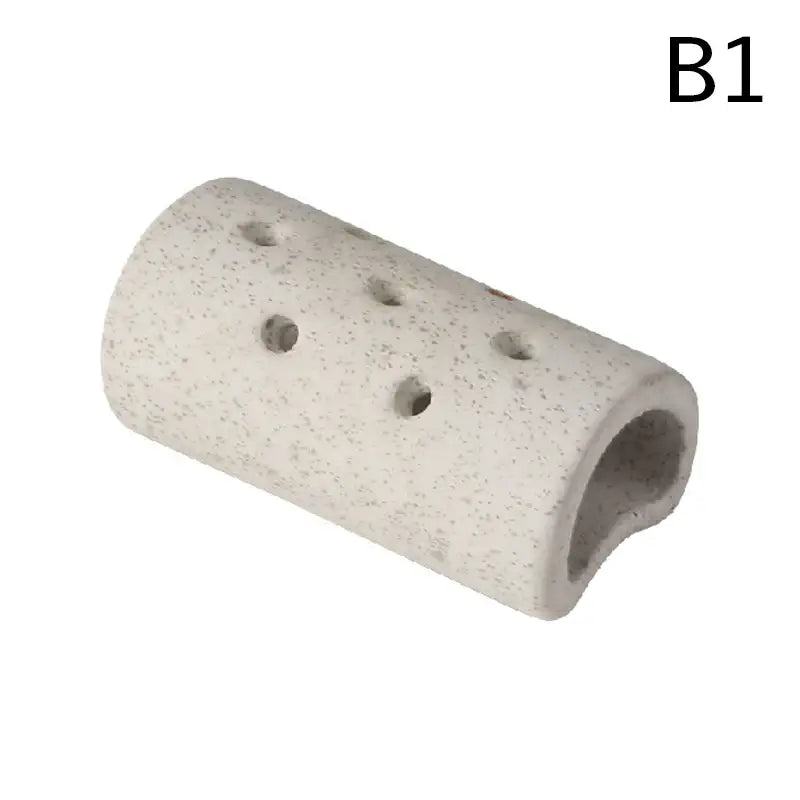 DecorBites™ lotus seedpod ceramic vase set with light gray speckled stone sand tube featuring multiple circular holes