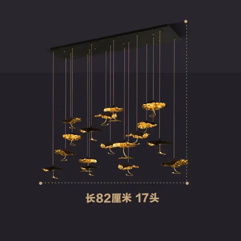 A modern decorbites lotus staircase chandelier with 17 golden lotus LED lights on black copper frame hanging lamp