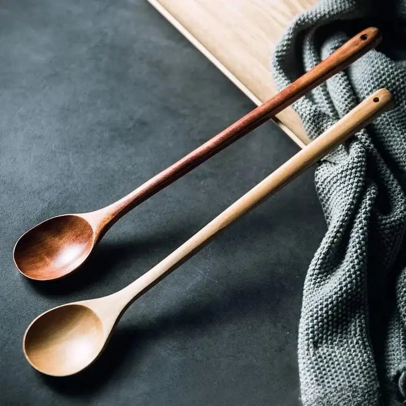 Two decorbites lotus wooden spoons with eco-friendly long handles in reddish-brown and natural light wood tones