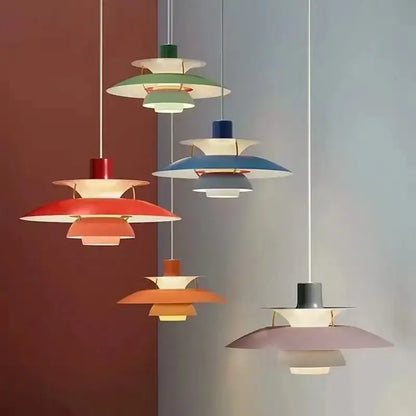A collection of DecorBites™ Loui LED pendant lights in vibrant multi-tiered shades for modern kitchen and living room decor