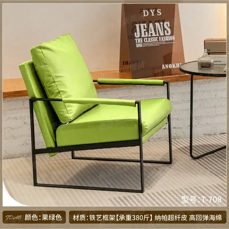 A modern lime green DecorBites lounge chair with black metal frame and cushioned seating for casual comfort