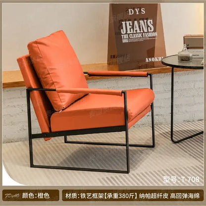 Decorbites™ lounge single sofa chair in orange leather with black metal frame ideal for coffee shop and reception areas