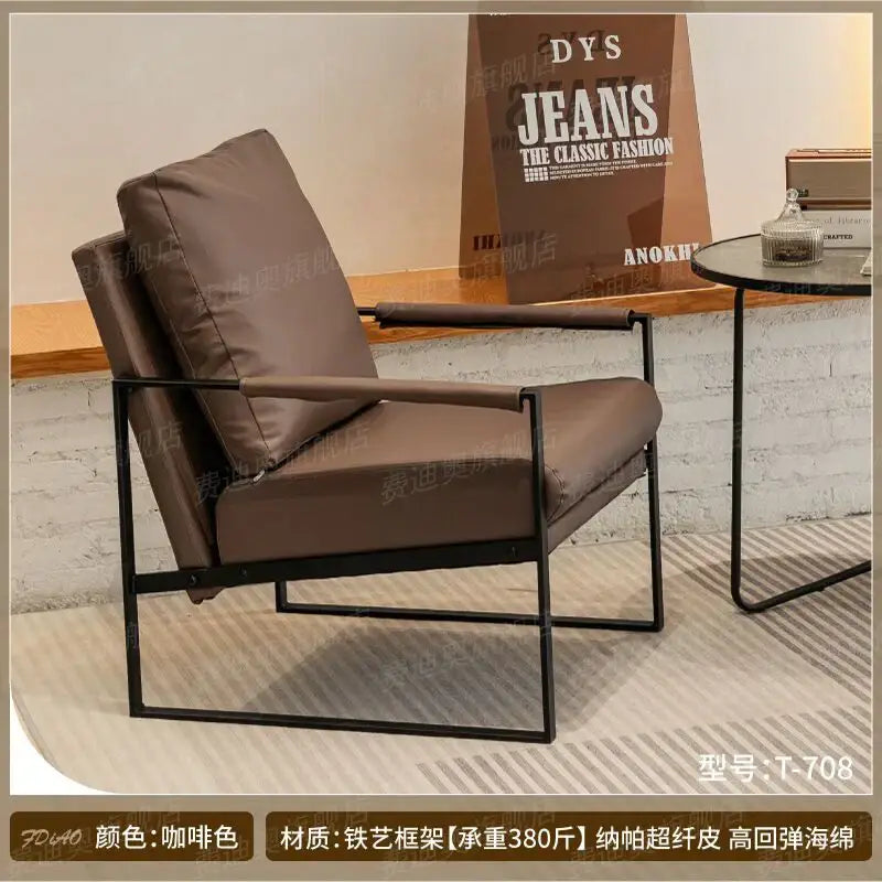DecorBites™ lounge single sofa chair in brown leather with black metal frame ideal for coffee shop or reception area seating