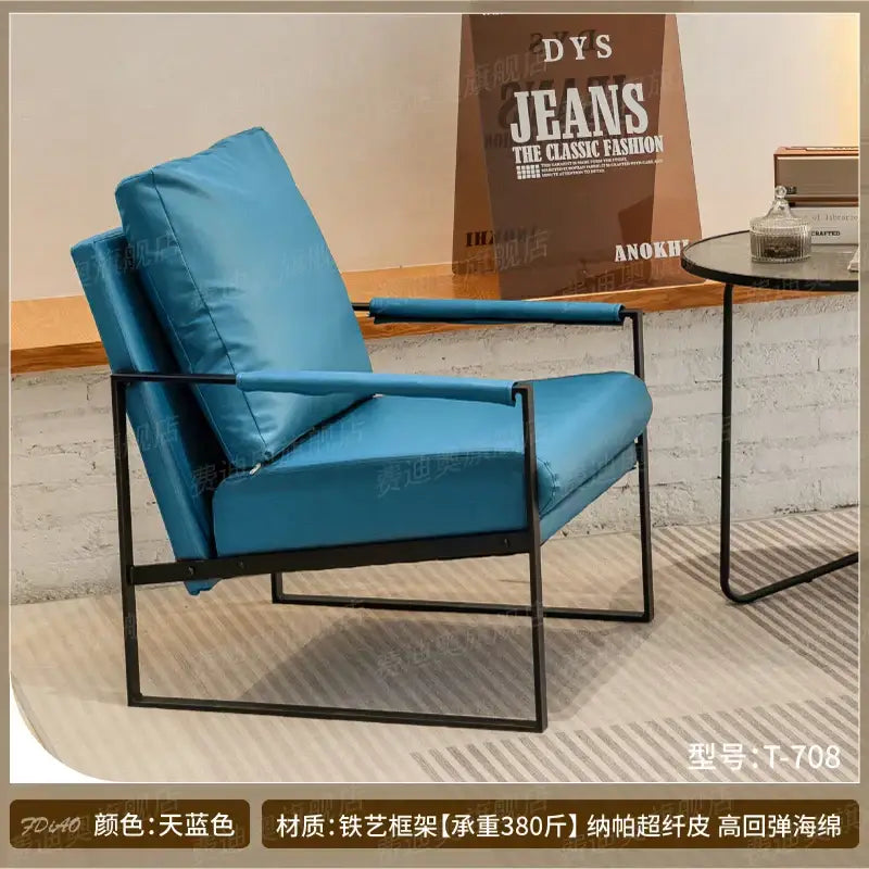 Decorbites™ single sofa chair with sleek black metal frame and plush turquoise high-resilience sponge cushions