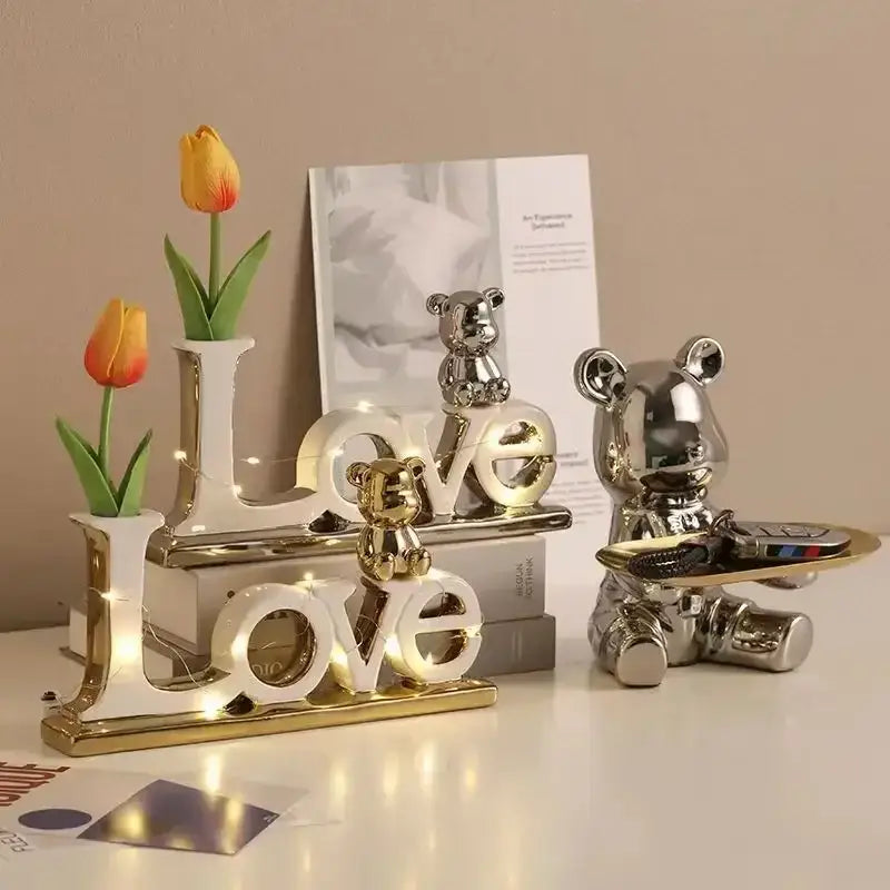Shiny metallic bear 3d ceramic figurine by decorbites love bear holding a tray with remote controls festive gift