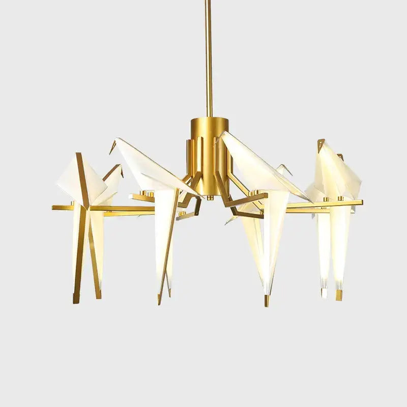 Gold-toned DecorBites love bird chandelier with origami crane design and white paper-like shades for dining room lighting