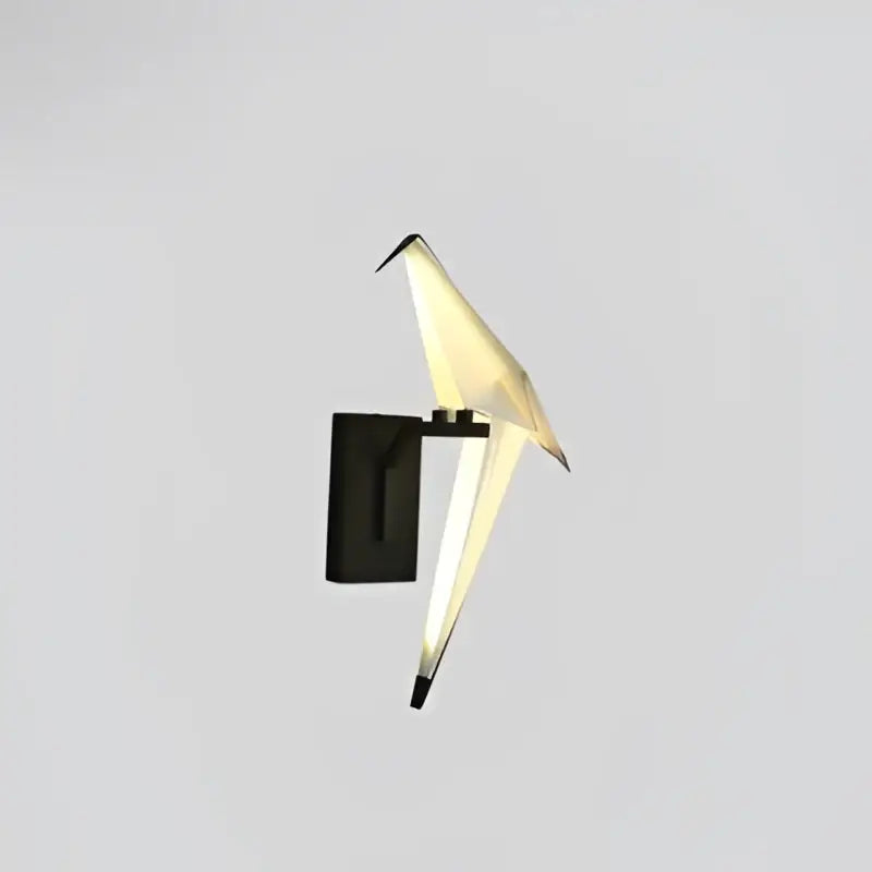 A decorbites love bird chandelier lighting fixture with translucent white wings and black base for elegant dining room decor