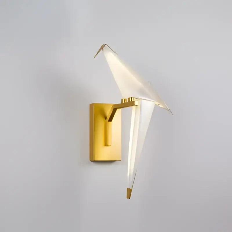 Gold-toned decorbites love bird wall sconce with translucent white glass wings for elegant dining room lighting