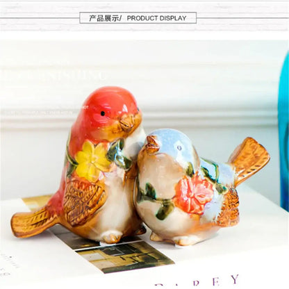 Two hand-painted love birds porcelain with red head yellow floral and blue head pink rose decorbites love birds ornament