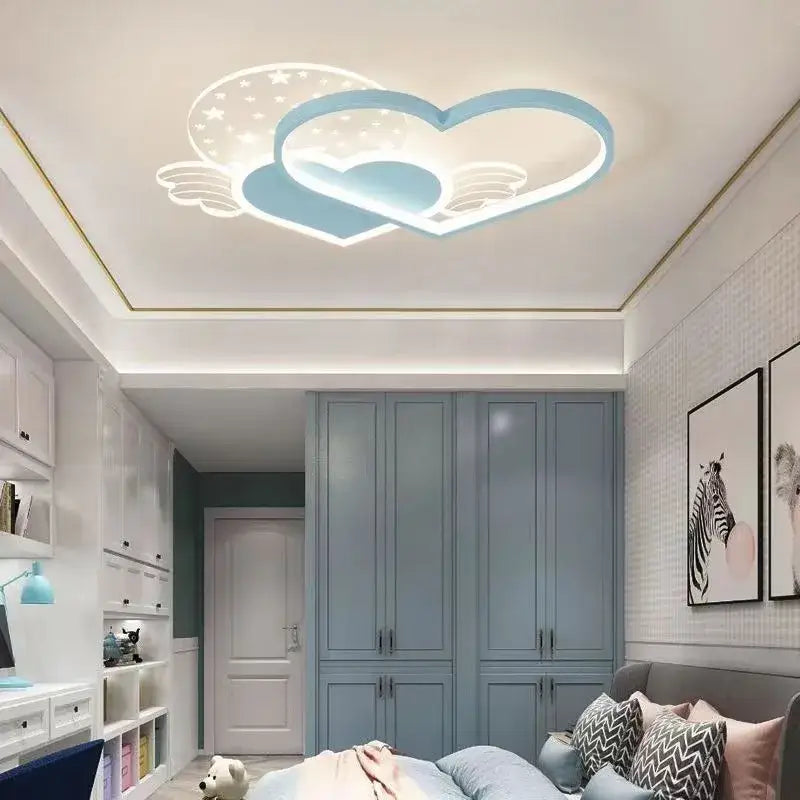 A modern decorbites love ceiling lamp with two interlocking blue heart shapes and starry cloud LED accents for kids room